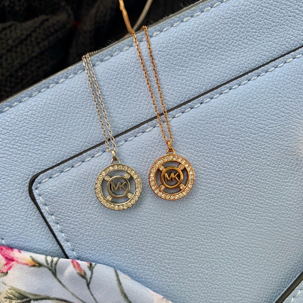 Michael Kors rose gold and silver necklaces
